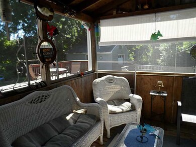 Porch. Another view of the front screened porch
