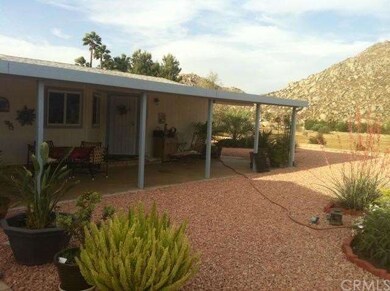 Covered front porch creates private courtyard