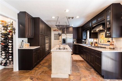 14 x 12 Kitchen with granite counters, gas cooktop