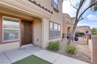 View of exterior entry with stucco siding, a tile