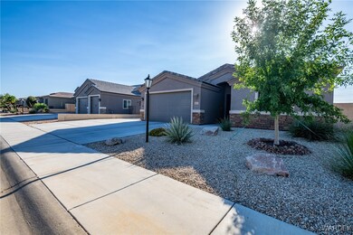 View of side of home with a garage