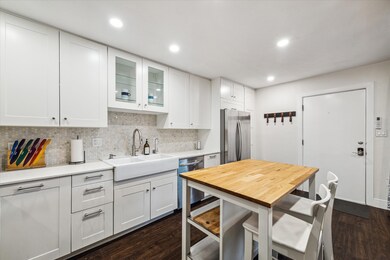 The light and bright kitchen is gorgeous while giv