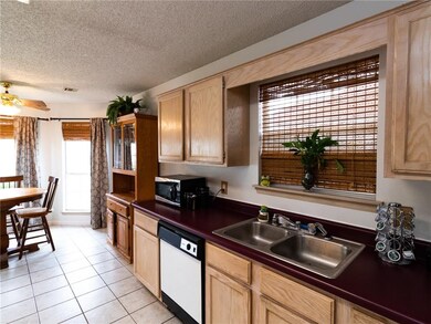 Ample kitchen with eat-in area- nice natural light and well laid out.