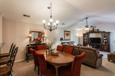 Quaint Dining Room 16x9- Open to Kitchen and Living, Vaulted Ceiling and new Chandelier. 