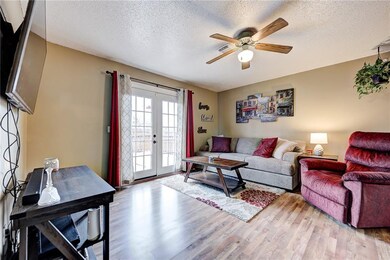 Spacious living room, French doors that open to la
