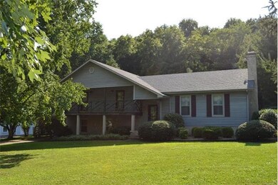 This shows the upper level covered deck and lower covered patio area.