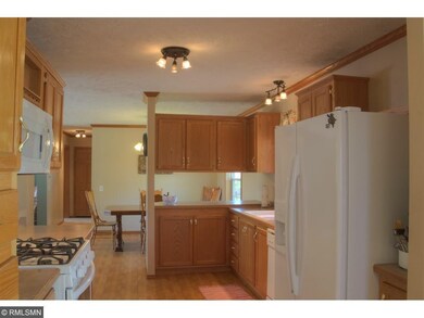 The kitchen into the dining room and in the distan