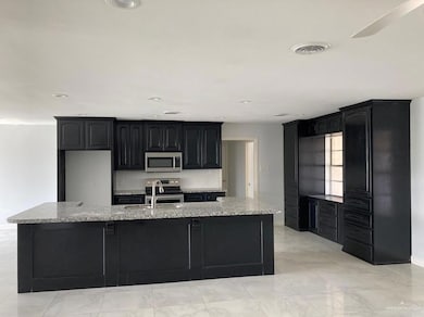 1114 W 4th St, Weslaco, TX 78596 - photo 3