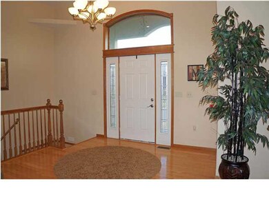 Beautiful Foyer With It's Vaulted Ceiling and Warm