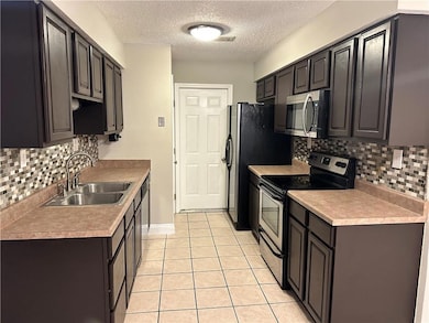 Updated kitchen with stainless appliances