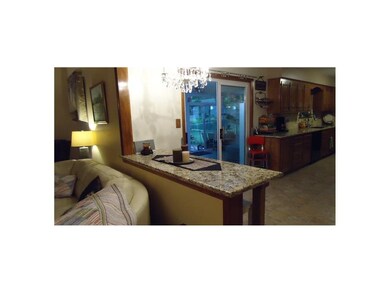 View of eat-in granite counter top