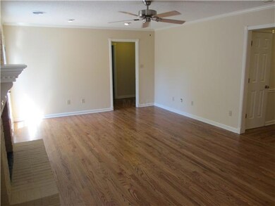 Large Great Room with recessed lighting and firepl