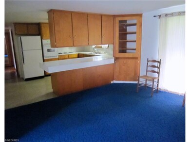 Openness from dining room leads into kitchen and h