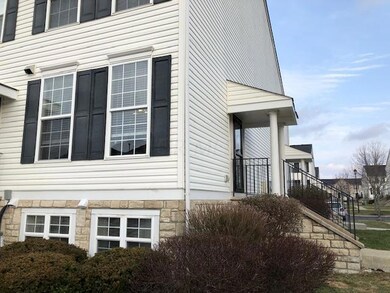 EXTERIOR FRONT AND SIDE OF CONDO