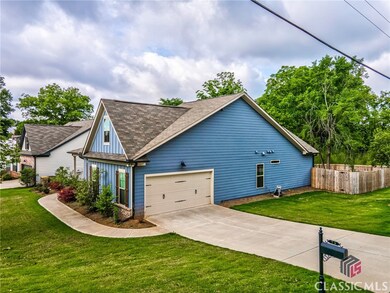 79 W Jefferson St, Hoschton, GA 30548 - photo 2