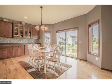 Sun-filled dinette with adjacent buffet bar.