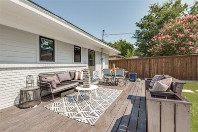 Wooden terrace with an outdoor hangout area