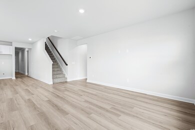 Unfurnished living room with light hardwood / wood