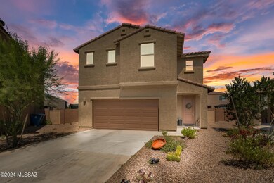 Front of Home with Sunset