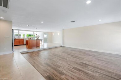 Spacious Living Room to Kitchen