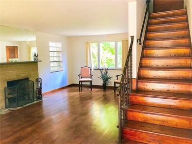 Refreshed hardwoods greet you as you enter the hom