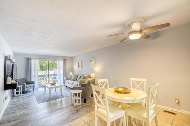 Dining space with hardwood / wood-style flooring, 