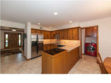 Wonderful tile flooring in kitchen & family room