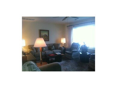Large picture window allows cheerful morning light