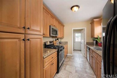 Kitchen with large pantry in the foreground.  Note