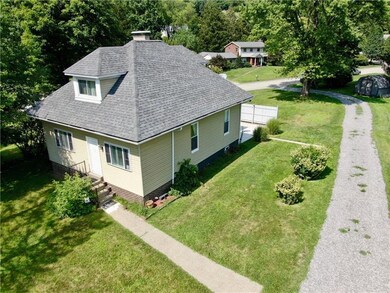 Front View Of Home & Driveway That Leads To Aqua D