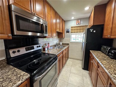 Renovated kitchen with granite and stainless