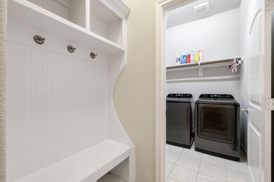 Clothes washing area featuring independent washer 