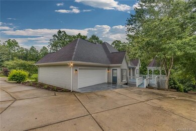 Attached 2 car garage.  Blue door lead to the Kitc
