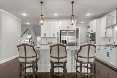 Kitchen featuring tasteful backsplash, white cabinetry, open shelves, ornamental molding, and recessed lighting