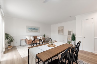 Dining room featuring light wood-style flooring a