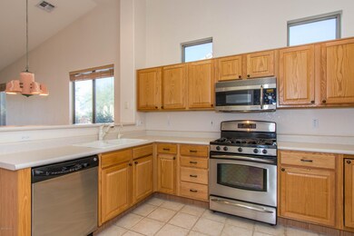 Stainless appliances in kitchen.