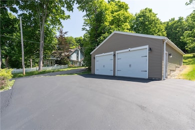 Newer garage.  Large enough for boat or 3 cars wit