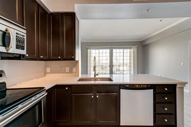 Beautiful open kitchen with stainless steel applia