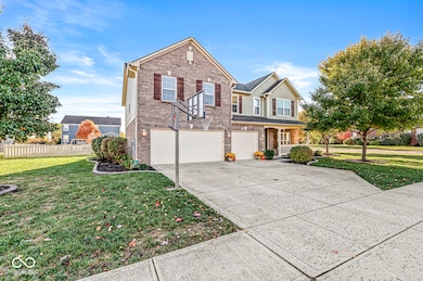 .30 acre. lot. (Basketball goal conveys with property.)