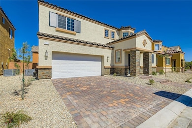 View of front of property featuring stucco siding,