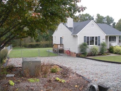 Exterior side and gravel driveway