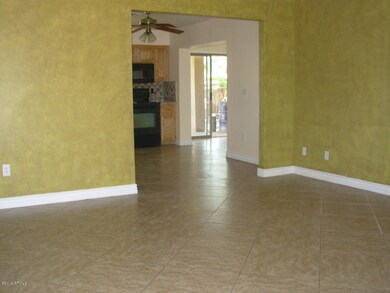 Front door view to back sliding door