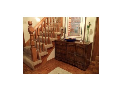 Entry, stairway to bedrooms.