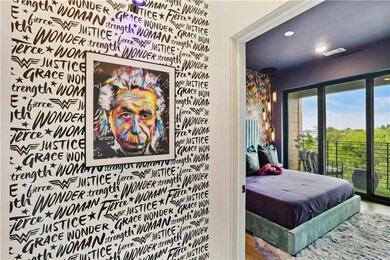 Bedroom featuring access to outside and recessed lighting