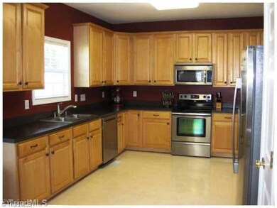 Kitchen. Spacious kitchen has amazing cabinet space.