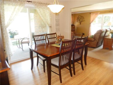 Walk out to your private side covered patio from t