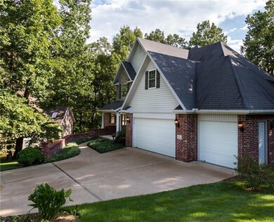 3 Car Garage and an Oversized Level Driveway Lots of Room for Parking !!
