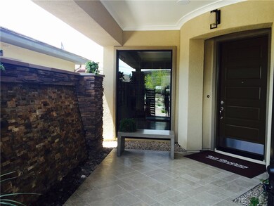 Photos are of the Gilmore model home entry and are