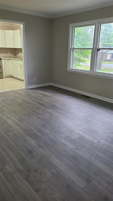 Opposite view of the living room looking into the kitchen