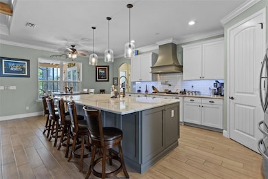 Kitchen Island with quartz counter and farmhouse sink